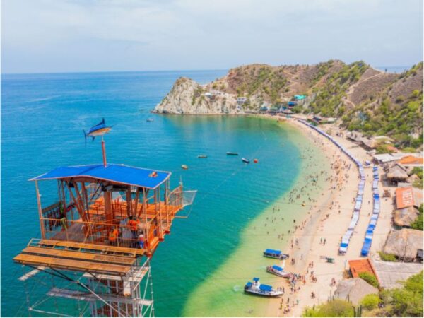 Combo de Actividades #13: Minca, Pozo Azul, Taganga y Playa Grande + Bahía Concha Parque Tayrona + Fiesta Blanca en Katamarán + Acuario con Show de Delfines y Playa Blanca + City Tour en Santa Marta (5 Tours)